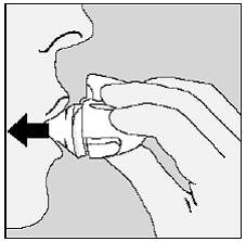 Remove any SPIRIVA 9mcg capsule pieces or SPIRIVA 9mcg powder buildup by turning your HANDIHALER device upside down and gently, but firmly, tapping it - Illustration